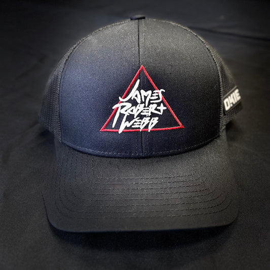 Front view of the JRW x OKIE Black Magic golf hat featuring clean structured panels and a curved bill, with the embroidered JRW logo prominently displayed on the crown.